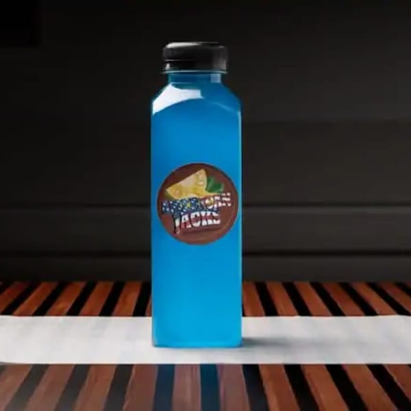 A blue bottled drink with a "Hesperian Jacks" label featuring a lemon and mint.